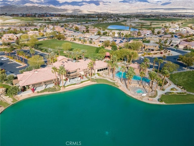 bird's eye view featuring a water and mountain view