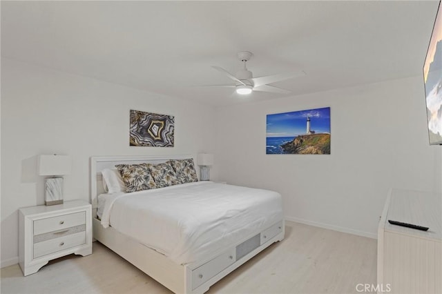 bedroom featuring ceiling fan and light hardwood / wood-style flooring