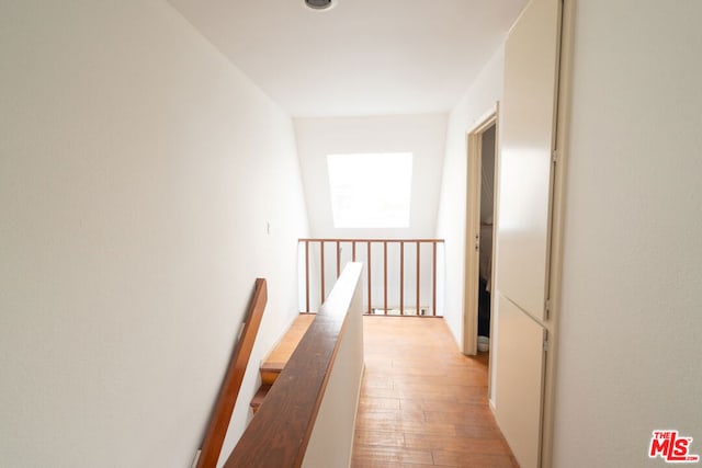 hall with light hardwood / wood-style flooring