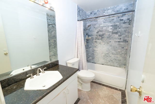 full bathroom featuring vanity, toilet, and shower / tub combo