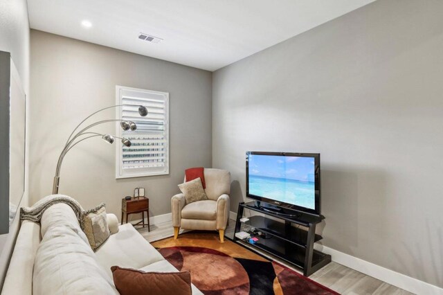 living room with wood-type flooring