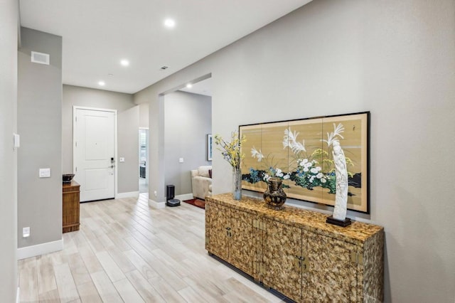 foyer with light hardwood / wood-style flooring