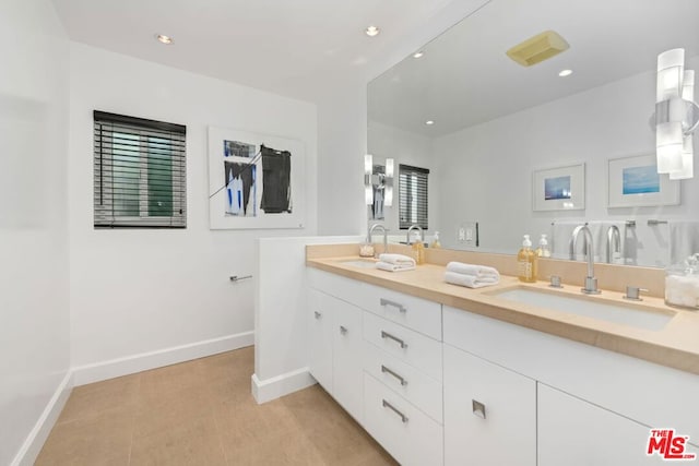 bathroom with hardwood / wood-style flooring and vanity