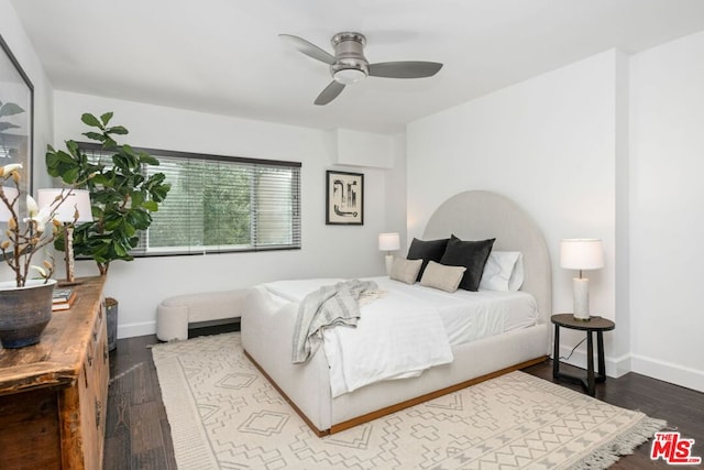 bedroom with hardwood / wood-style flooring and ceiling fan