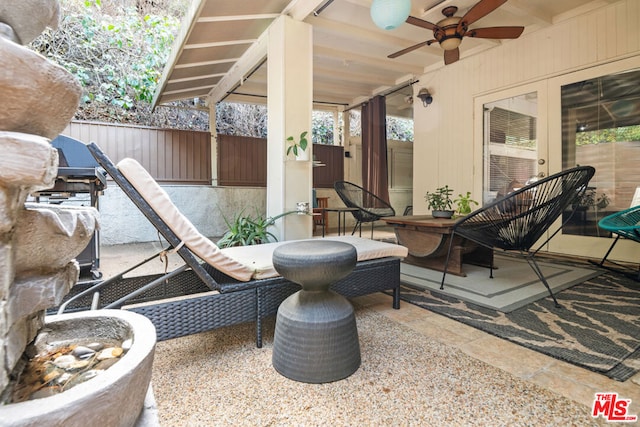 view of patio with ceiling fan