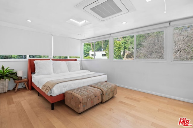 bedroom featuring light hardwood / wood-style floors