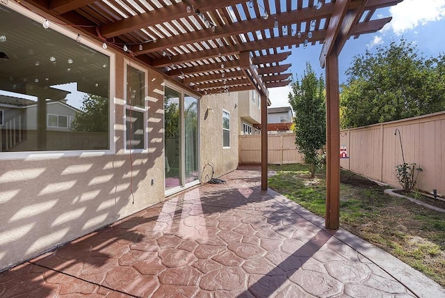 view of patio featuring a pergola