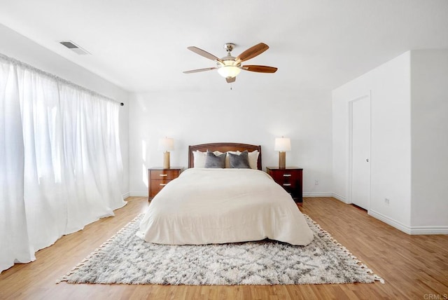 bedroom featuring ceiling fan and light wood-type flooring