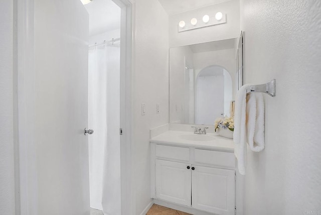 bathroom featuring vanity and tile patterned floors