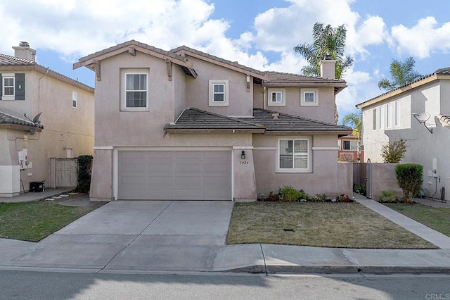 front of property featuring a garage