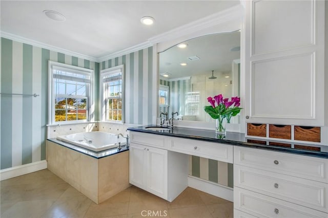 bathroom featuring a garden tub, vanity, a shower stall, tile patterned floors, and wallpapered walls