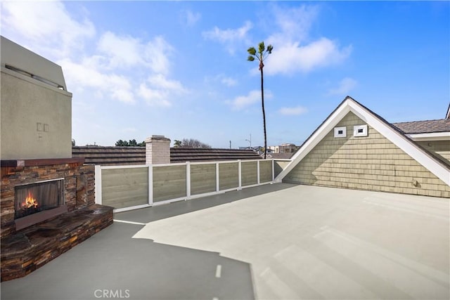 22052 Susan Ln, Huntington Beach, CA 92646 - view of patio / terrace with an outdoor stone fireplace