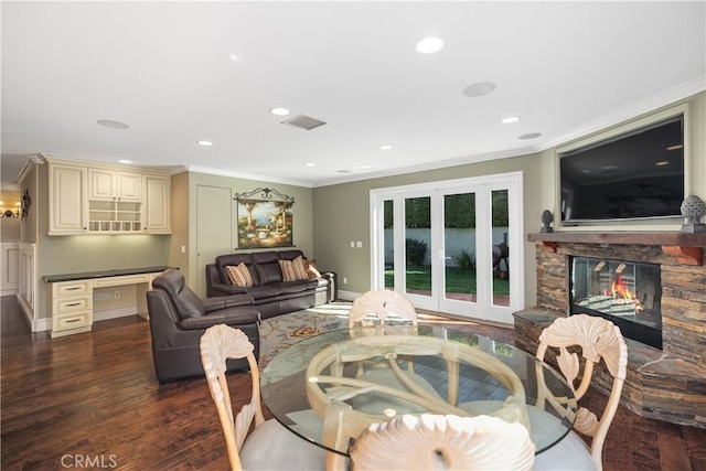22052 Susan Ln, Huntington Beach, CA 92646 - living room featuring crown molding, a fireplace, dark wood-type flooring, recessed lighting, and baseboards