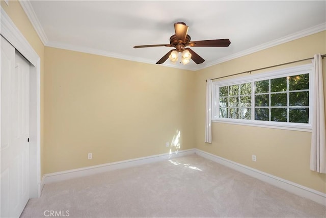 22052 Susan Ln, Huntington Beach, CA 92646 - unfurnished bedroom with a closet, crown molding, carpet floors, baseboards, and ceiling fan