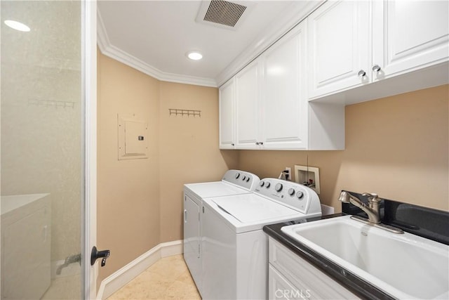 22052 Susan Ln, Huntington Beach, CA 92646 - laundry room with washer and clothes dryer, cabinet space, electric panel, baseboards, and light tile patterned flooring