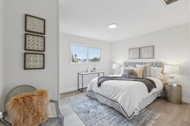 bedroom featuring light wood-type flooring