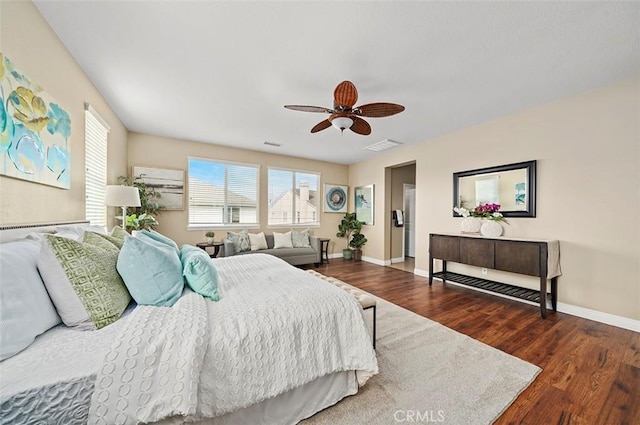 bedroom with ceiling fan and hardwood / wood-style floors