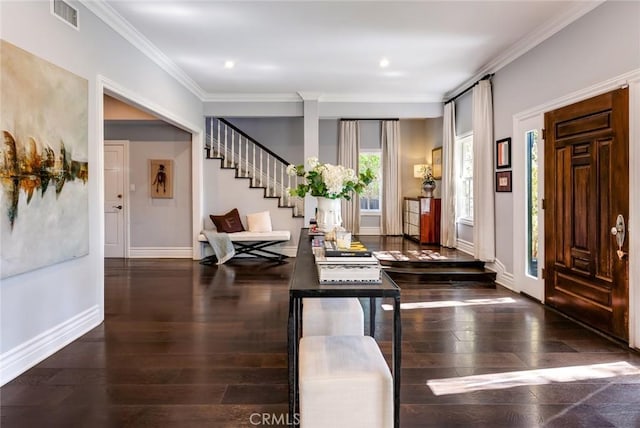 entryway with crown molding and dark wood-type flooring