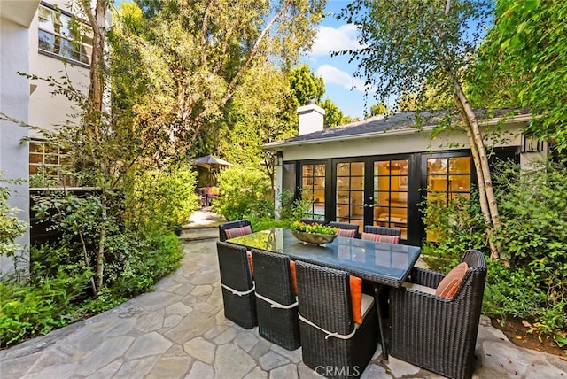 view of patio featuring french doors