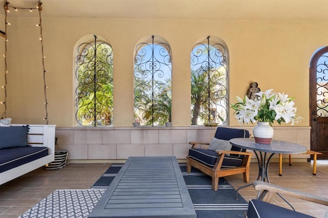 sunroom featuring plenty of natural light