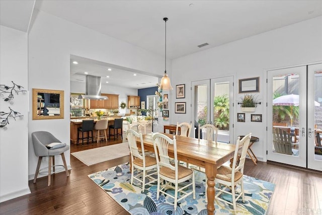 dining area with visible vents, baseboards, recessed lighting, dark wood-style flooring, and french doors