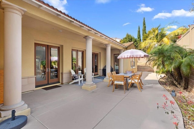 view of patio / terrace featuring french doors and outdoor dining space