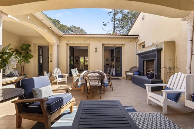 view of patio / terrace with an outdoor living space and outdoor dining area