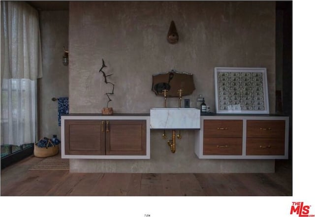 bathroom featuring hardwood / wood-style flooring