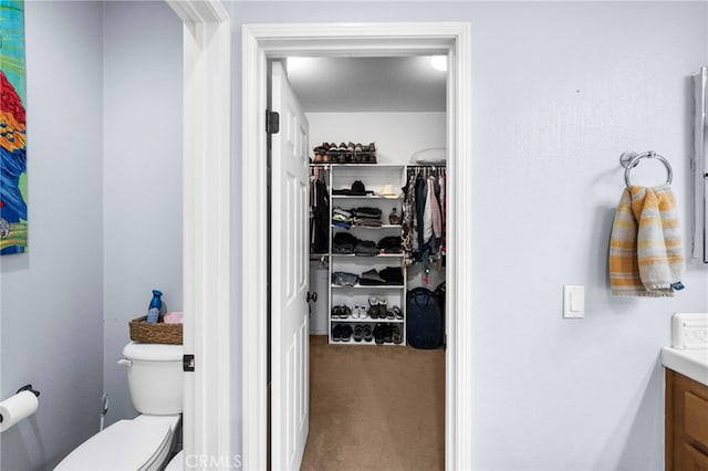 bathroom with vanity and toilet