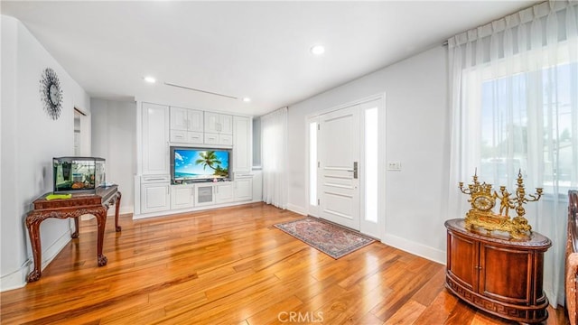 foyer with light wood-type flooring