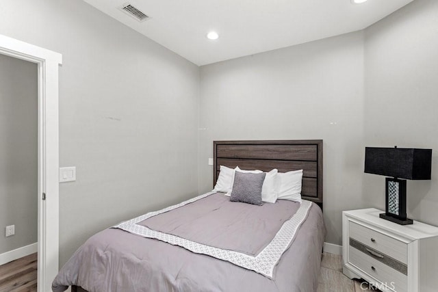 bedroom with light wood-type flooring