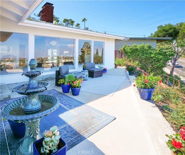 view of patio with an outdoor living space