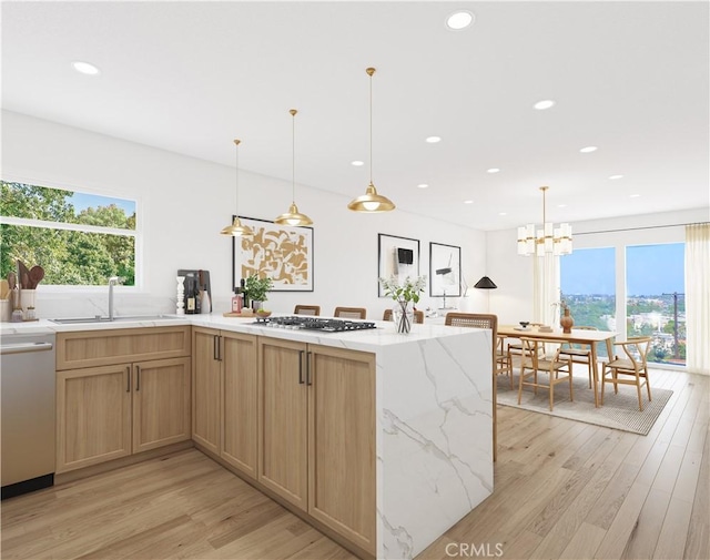 4160 Via Lado, Torrance, CA 90505 - kitchen featuring light wood-type flooring, a sink, dishwasher, light stone counters, and stainless steel gas stovetop