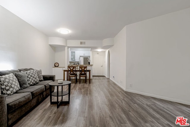 living room with hardwood / wood-style floors