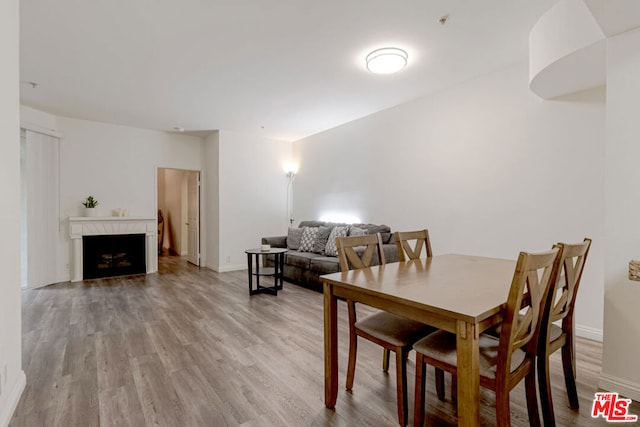 dining room with light hardwood / wood-style floors