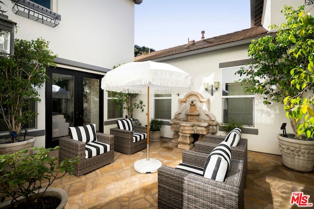 view of patio / terrace featuring an outdoor hangout area and french doors