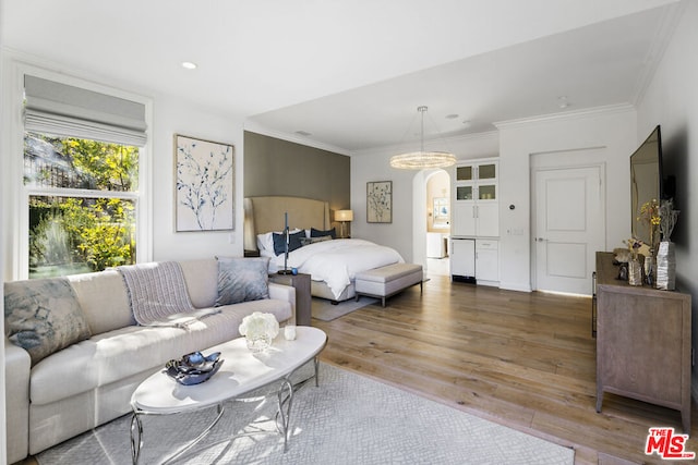 bedroom with crown molding and dark wood-type flooring