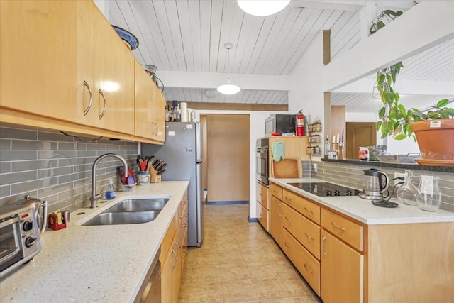 kitchen with sink, tasteful backsplash, pendant lighting, stainless steel appliances, and light stone countertops