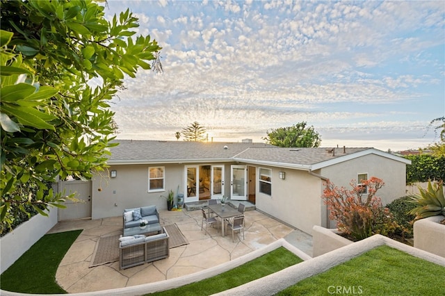 rear view of property with a patio area