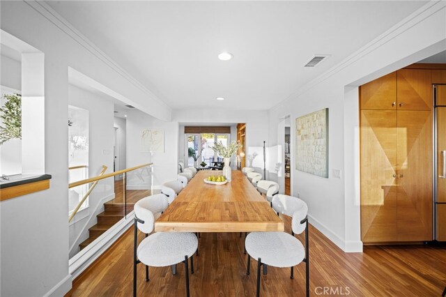 331 Ledroit St, Laguna Beach, CA 92651 - dining area featuring visible vents, baseboards, ornamental molding, recessed lighting, and wood finished floors