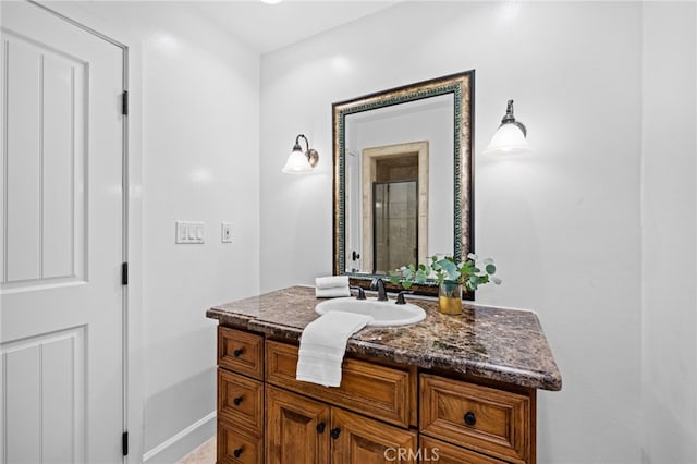 331 Ledroit St, Laguna Beach, CA 92651 - bathroom featuring baseboards, vanity, and a shower with door