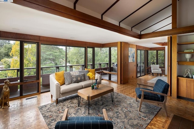 sunroom with lofted ceiling