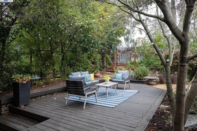 wooden deck with an outdoor hangout area