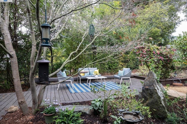 wooden deck with an outdoor hangout area