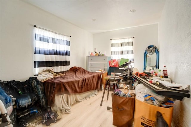 bedroom featuring light wood-type flooring