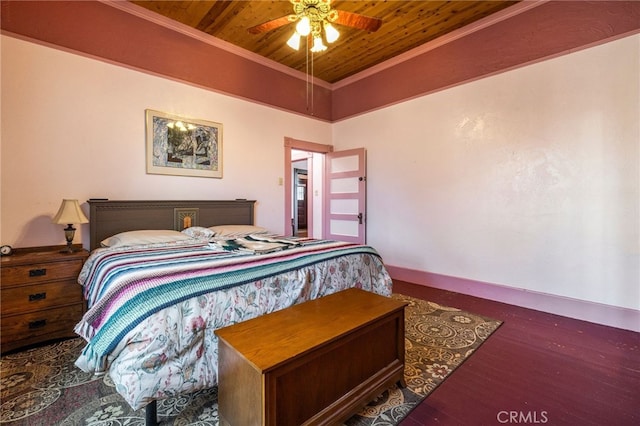 bedroom with crown molding, ceiling fan, wooden ceiling, and dark hardwood / wood-style flooring