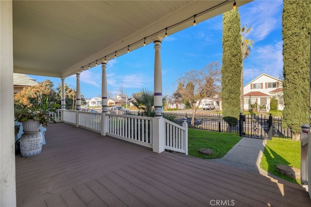 wooden deck featuring covered porch