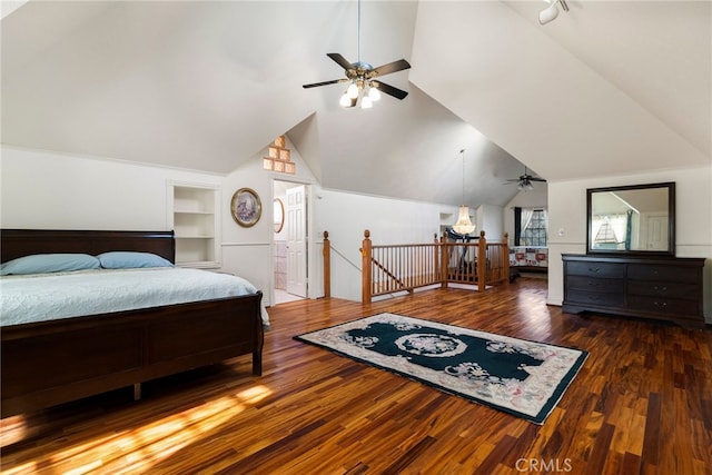 bedroom featuring dark hardwood / wood-style floors and high vaulted ceiling