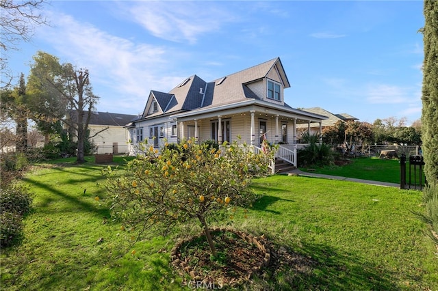 exterior space featuring covered porch and a front lawn