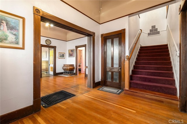 entrance foyer featuring wood-type flooring